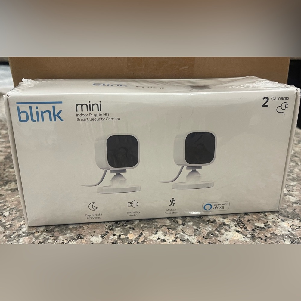 Blink Mini by Amazon – 2 Compact indoor plug-in smart security cameras.